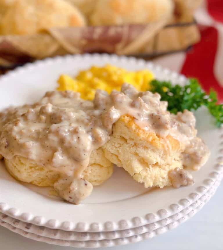 Sausage Gravy on top of biscuits with scrambled eggs.