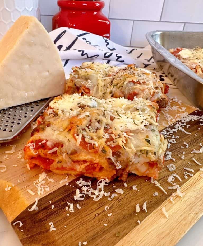 Deep dish hot pocket pizza slices on a cutting board.