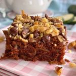 Chocolate Zucchini Walnut Cake square on a plate.