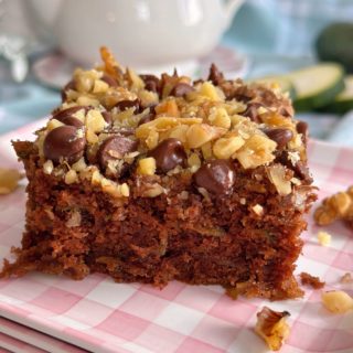 Chocolate Zucchini Walnut Cake square on a plate.