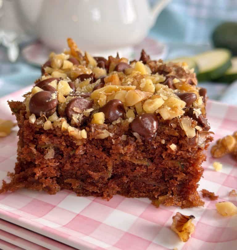 Chocolate Zucchini Walnut Cake square on a plate.