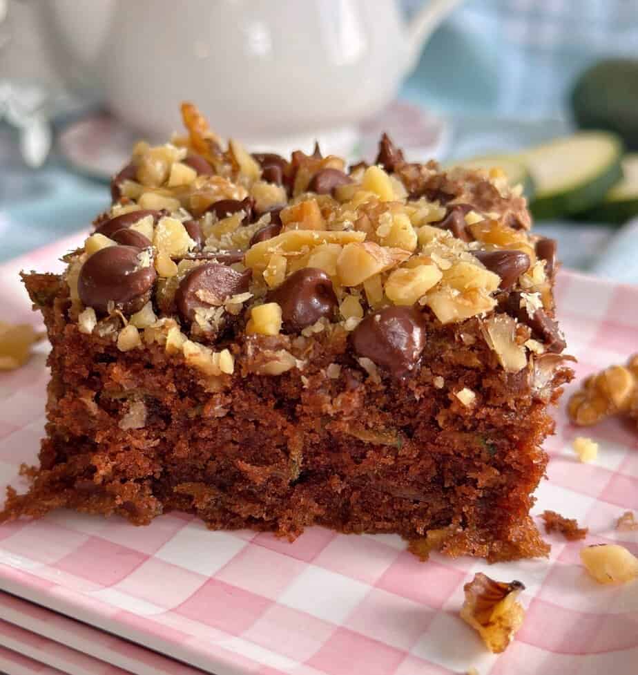Chocolate Zucchini Walnut Cake square on a plate.
