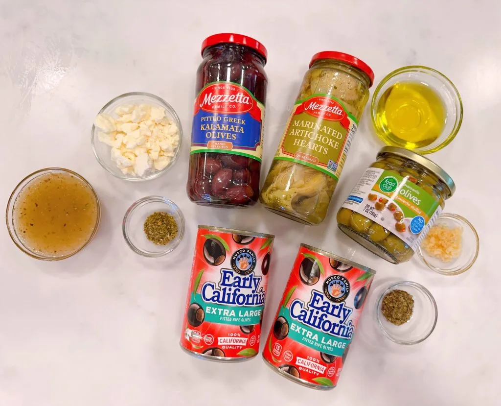 Ingredients for marinated olives with feta cheese.