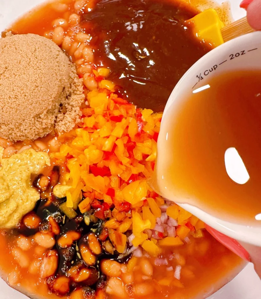 Adding 1/4 cup vinegar to baked bean recipe.