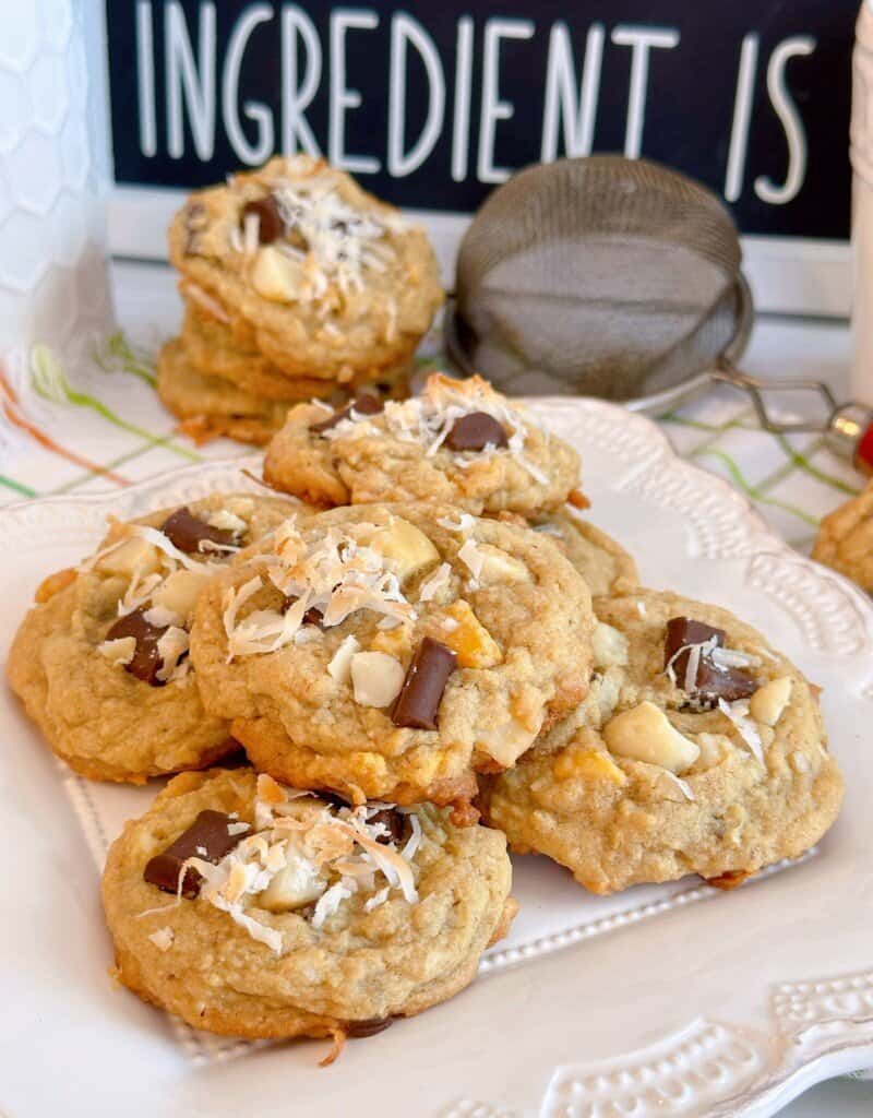 Plate full of coconut mango chocolate chunk cookies.