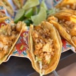 Close-up photo of a Blackstone Tilapia Taco in a taco holder.