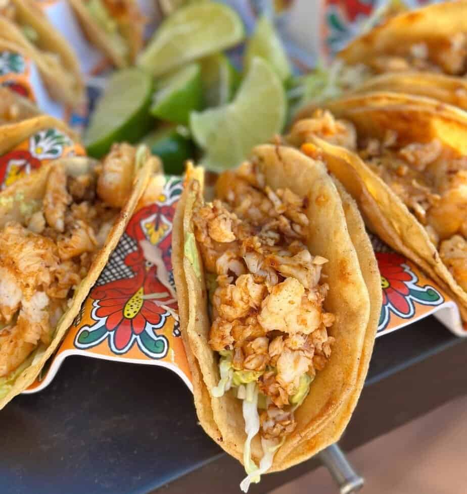 Close-up photo of a Blackstone Tilapia Taco in a taco holder.