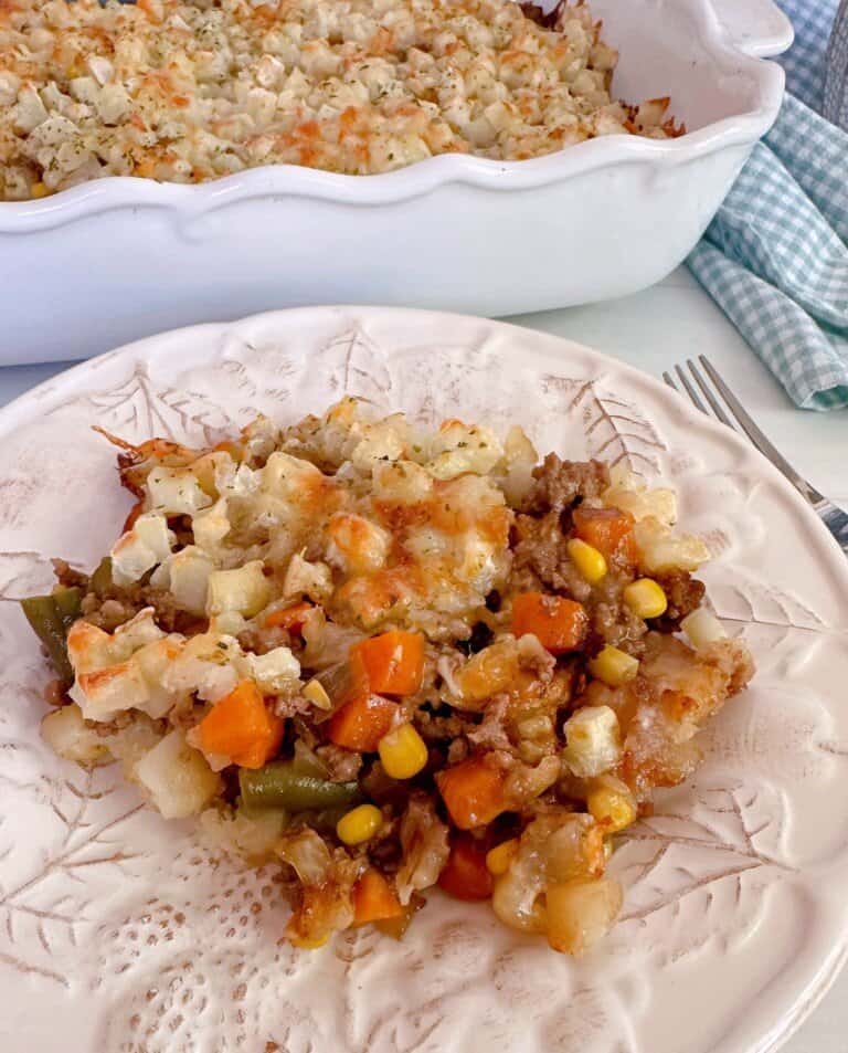 Delicious Layered Beef and Potato Casserole served on a white plate.