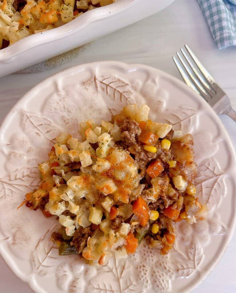Overhead photo of a serving of beef and potato layered casserole.