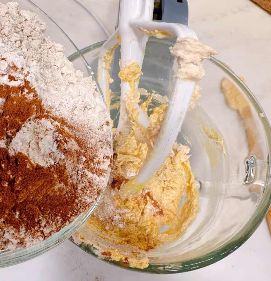 Adding dry ingredients to wet. 