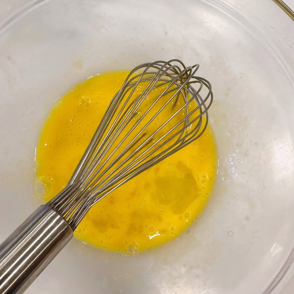 Lightly beaten eggs.