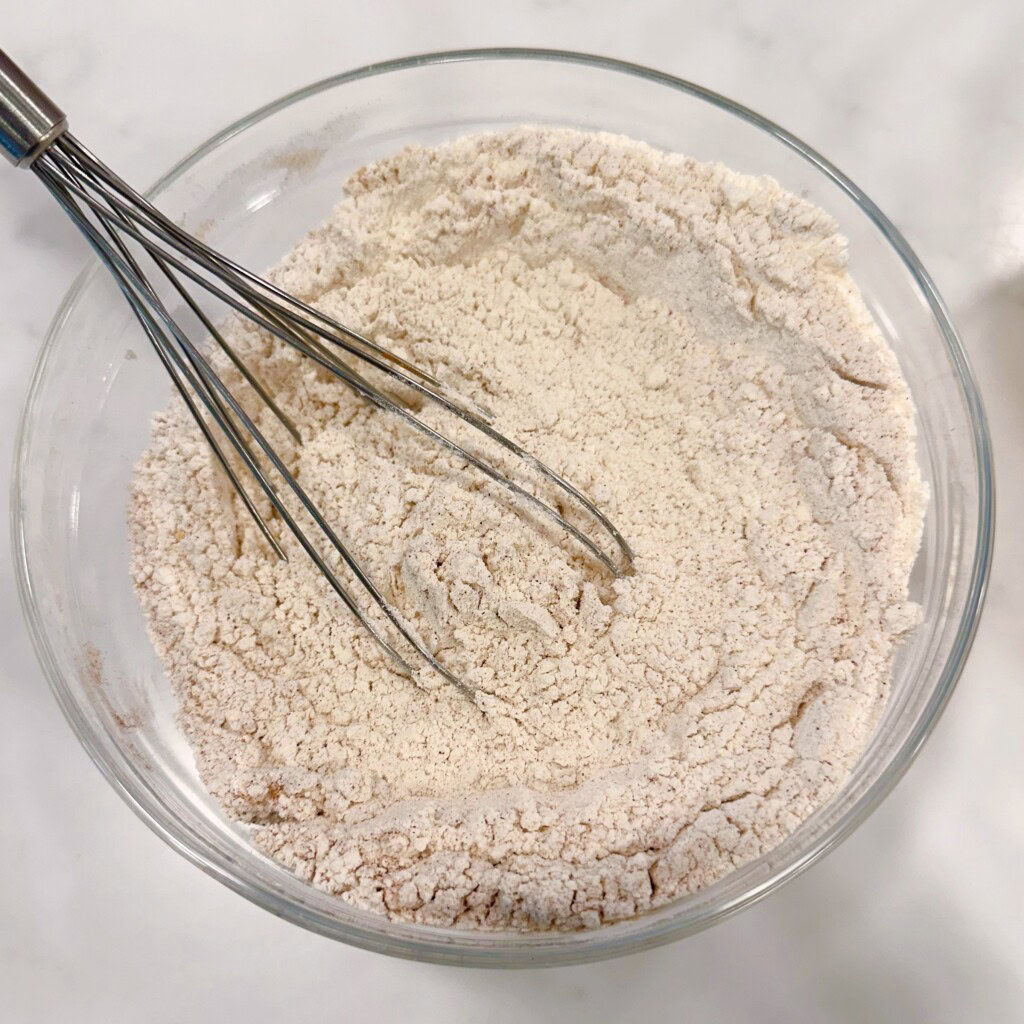 Dry cake ingredients mixed together in a small bowl.