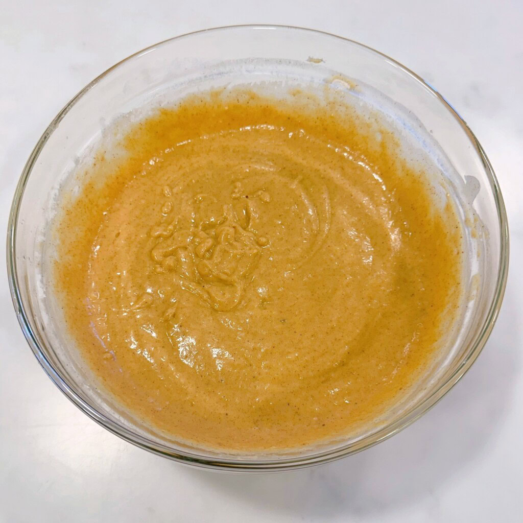 Mixed cake batter in the bowl.