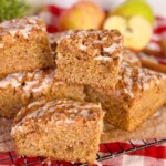 Cut Apple Cider Cake on a cooling rack.