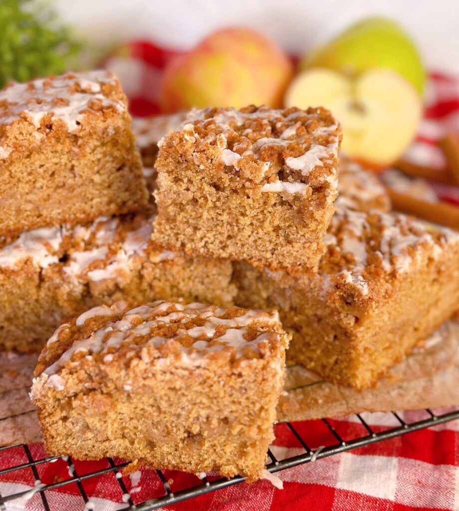 Cut Apple Cider Cake on a cooling rack.