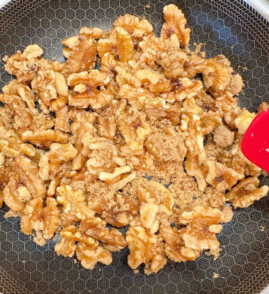 Preparing the pecans, with sugar, and corn syrup.