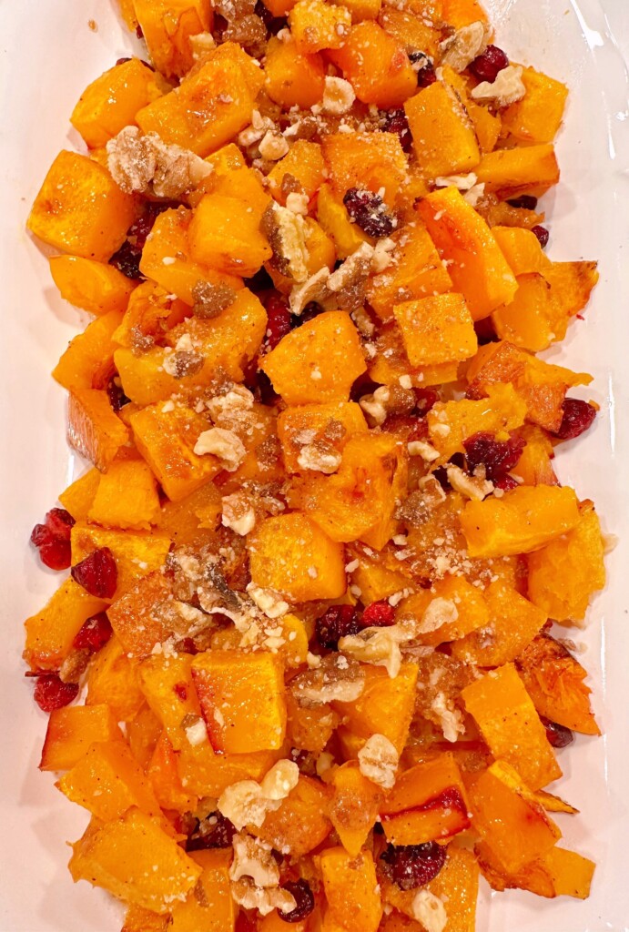 Adding the candied pecans.