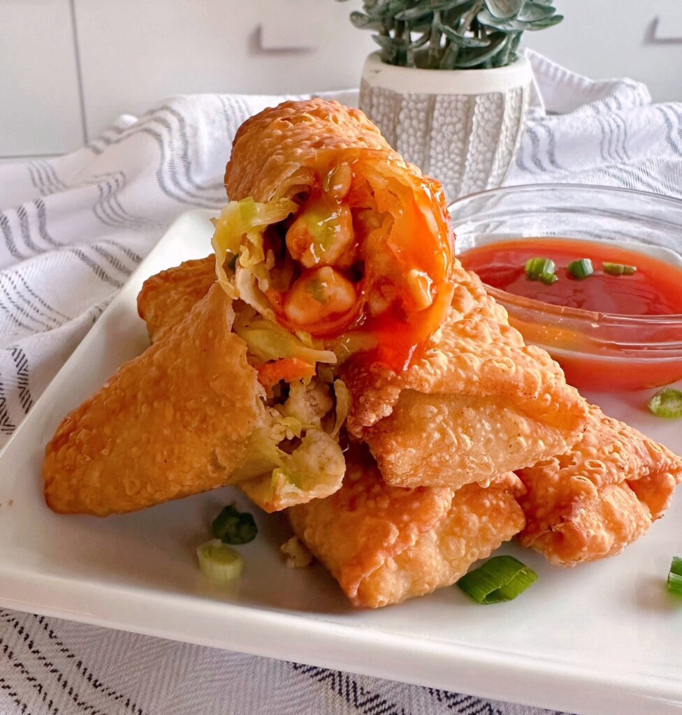 Egg rolls with dipping sauce. Sweet and sour.