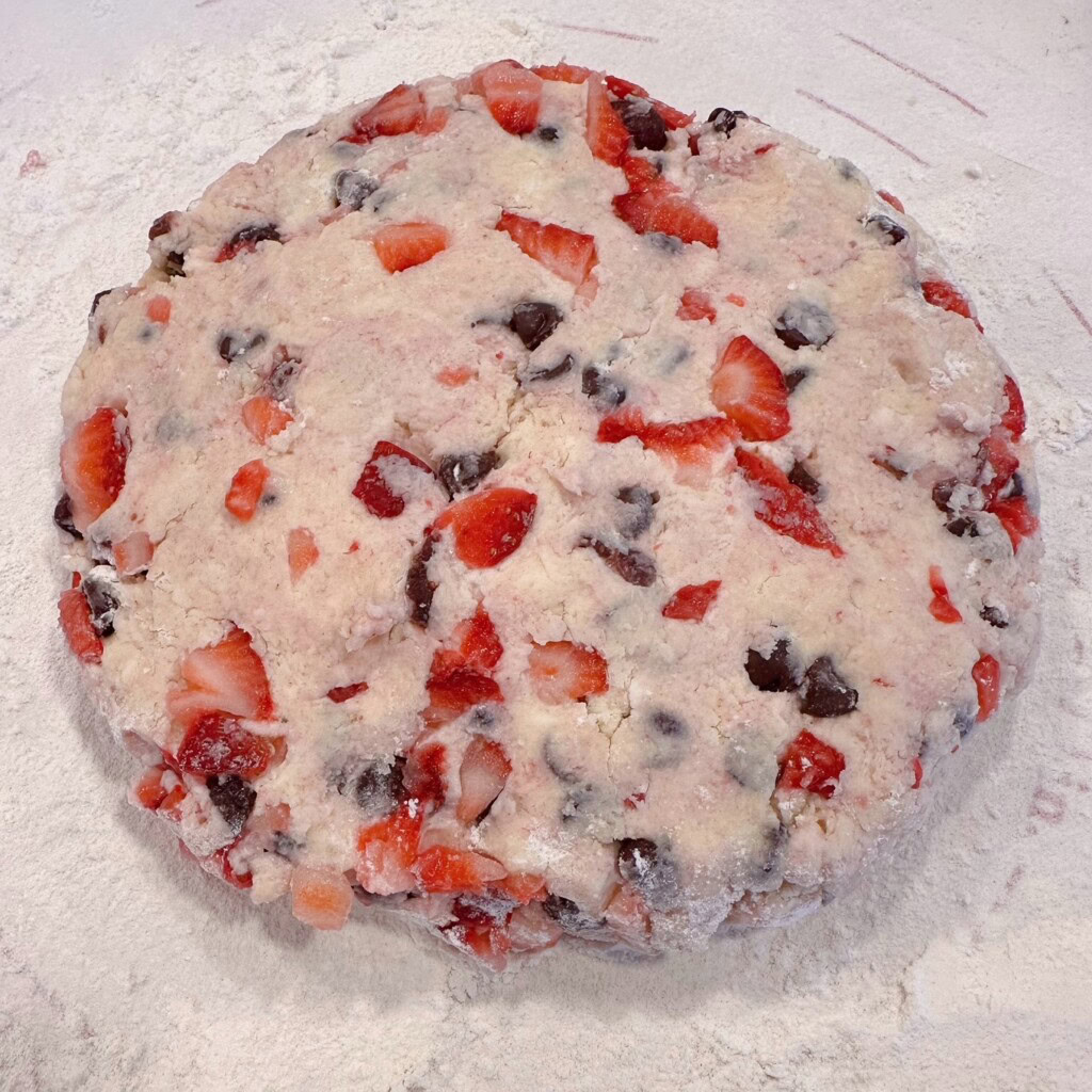 Scone dough gathered into a 10-inch circle.