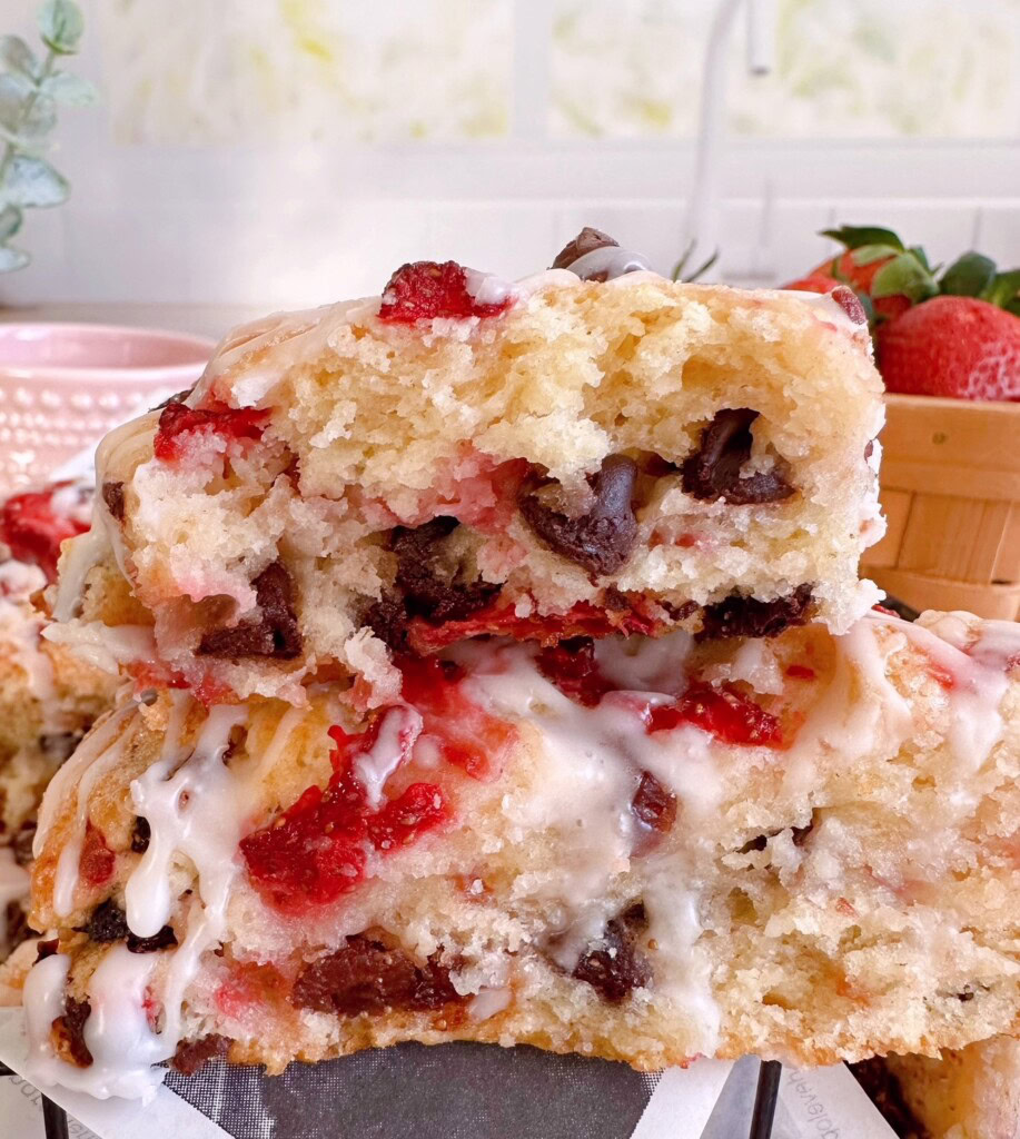 Strawberry scone broken in half and looking delicious.