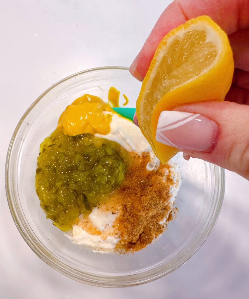 Combing Tartar sauce ingredients.