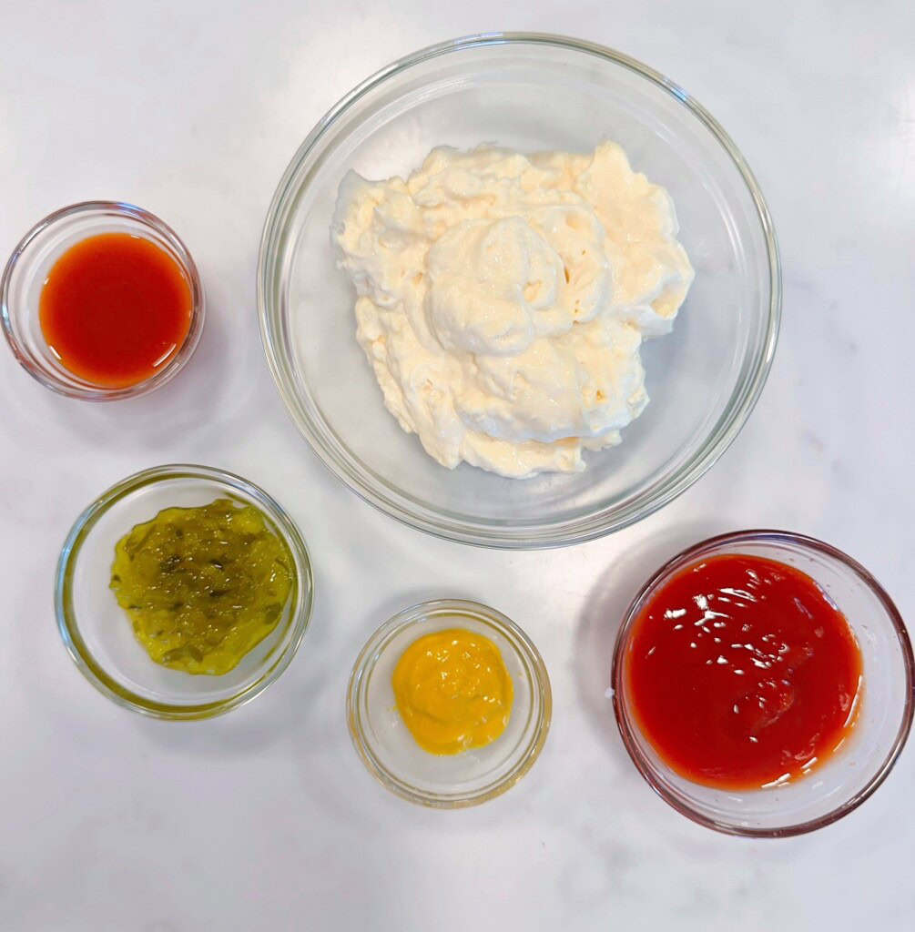 Ingredients for Secret Burger Sauce in bowls.