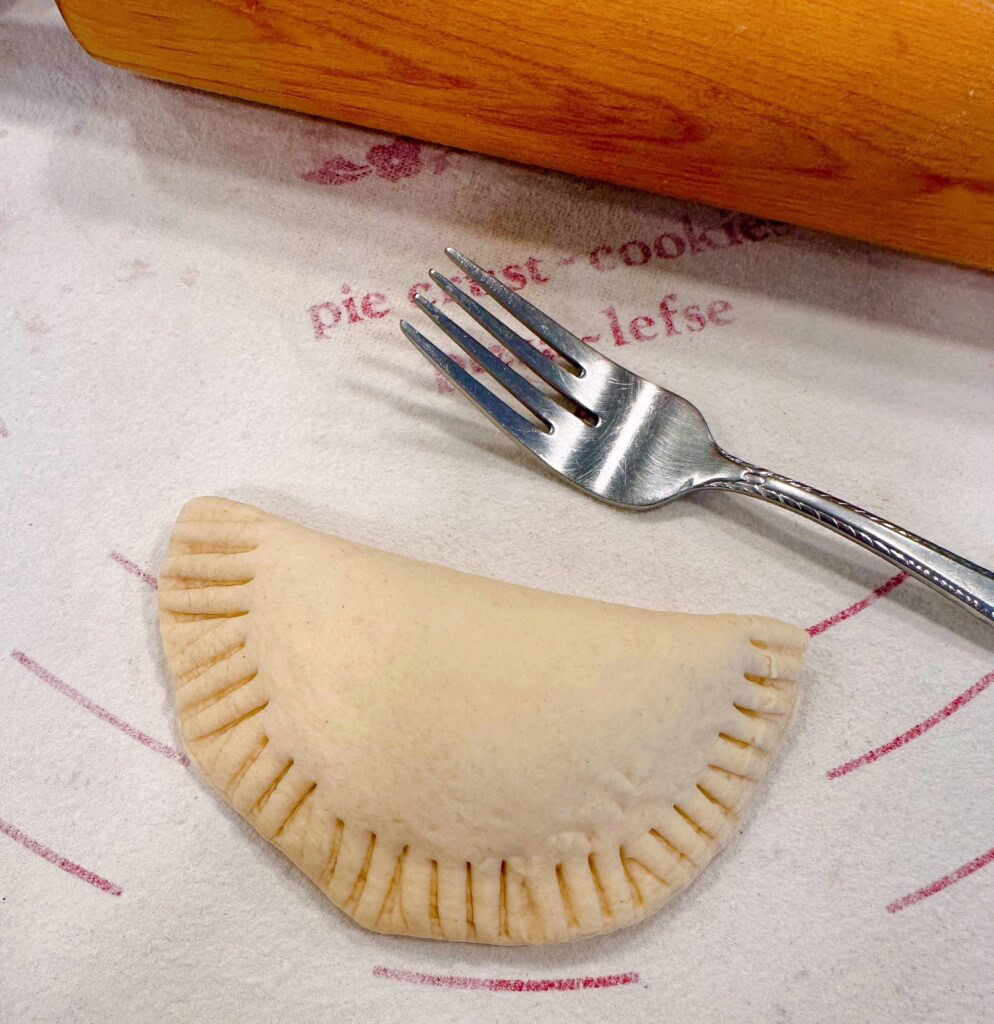 Each hand pie made and crimped with a fork.