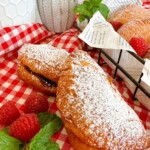 Hand pies with powdered sugar.