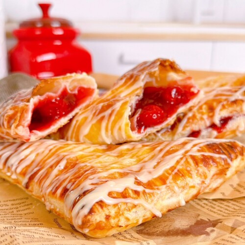 Cherry Turnovers on a kitchen counter.
