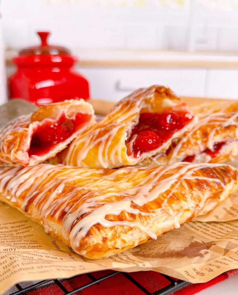 Cherry Turnovers on a kitchen counter.