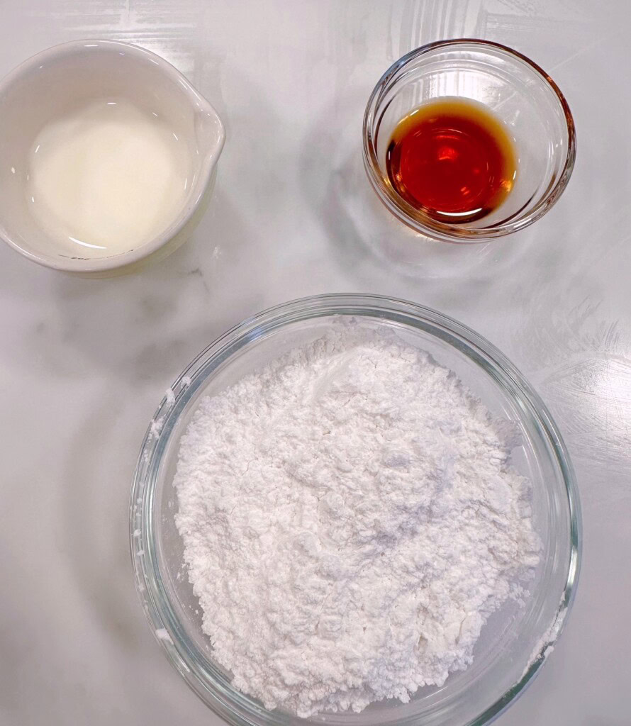 Ingredients for vanilla almond glaze.
