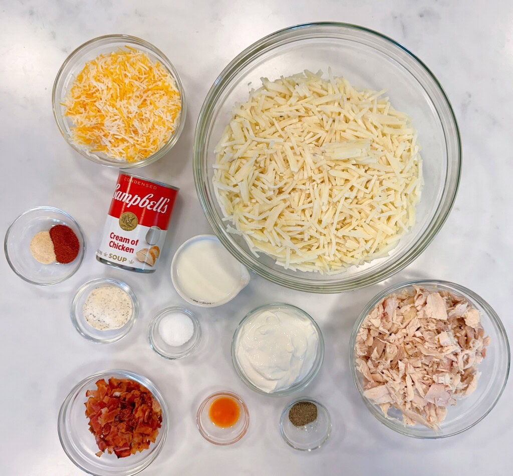 Ingredients for Loaded Chicken and Hash Brown Casserole on a kitchen counter top.