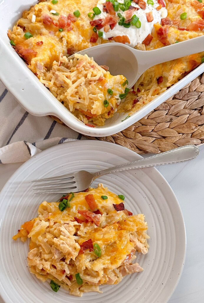Loaded Chicken and Hash Brown Casserole Recipe with full casserole and a serving size on a small plate.