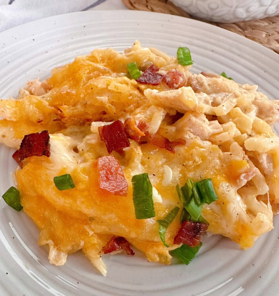 Scoopful of chicken and hash brown casserole.