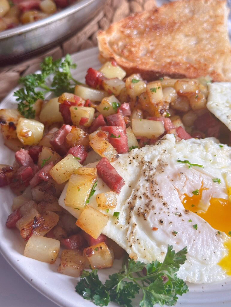 Corned Beef hash with fried eggs.