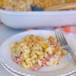 Creamy Ham and Noodle Casserole on a stacked dinner plate.