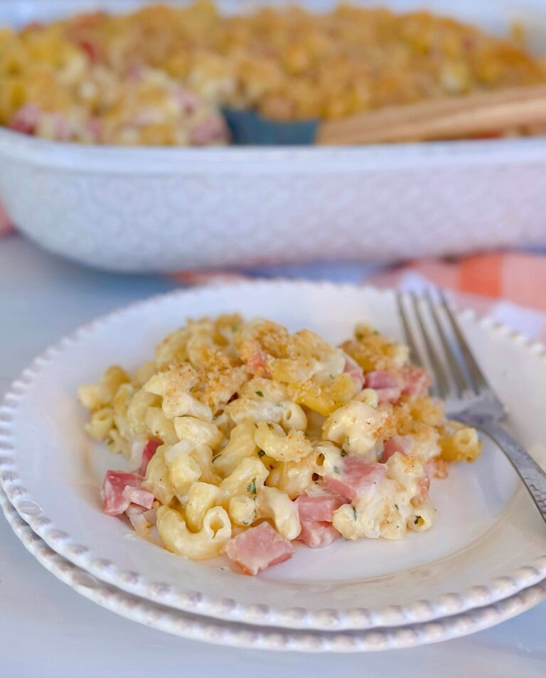 Creamy Ham and Noodle Casserole on a stacked dinner plate.