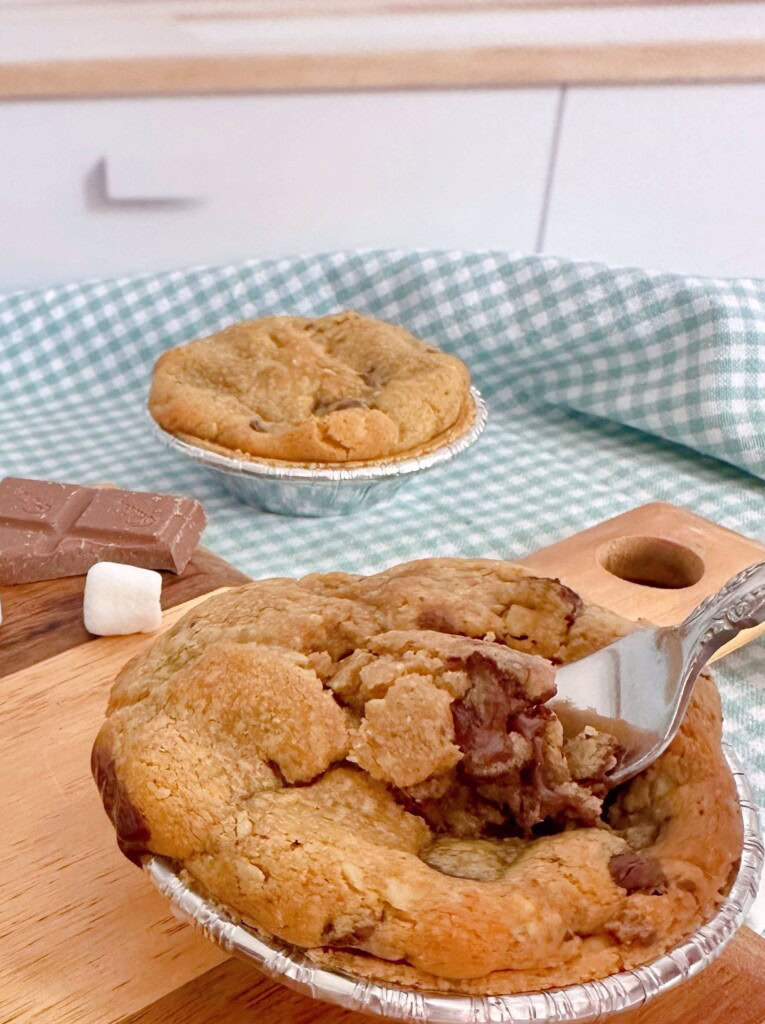 Fork digging into a mini S'mores Pie.