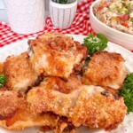 Oven Fried Chicken piled high on a dinner platter.