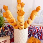 Firecracker Hot Dog Skewers with Star Tater Tot on top.