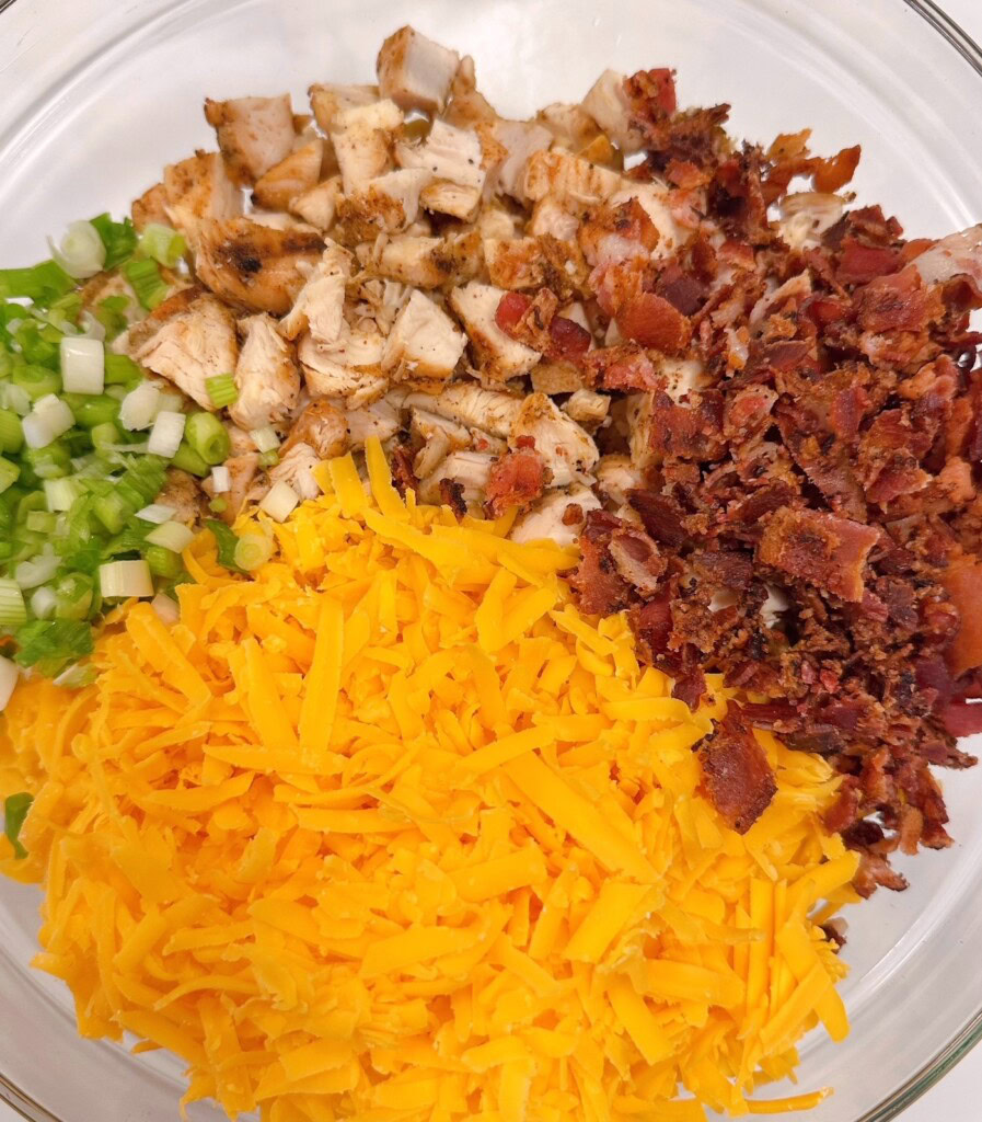 Adding all the pasta salad ingredients in large bowl.