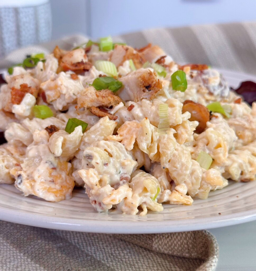 Up close photo of pasta chicken bacon salad.