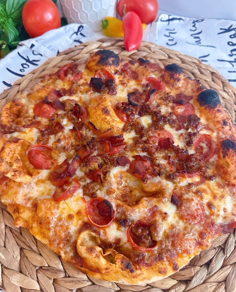 Baked Pizza on a natural mat.