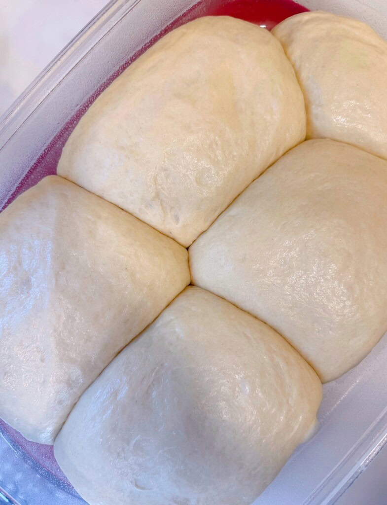 Pizza dough risen for the second time.