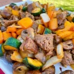 Grilled Teriyaki Steak and Vegetable Stir Fry on a serving platter.