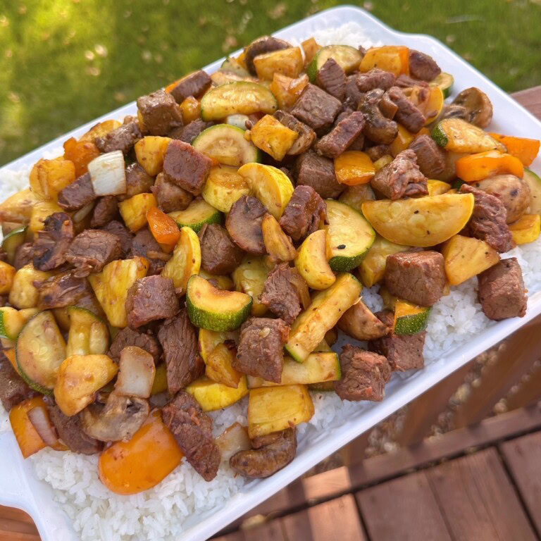 A platter full of Grilled Teriyaki Steak Stir-Fry.