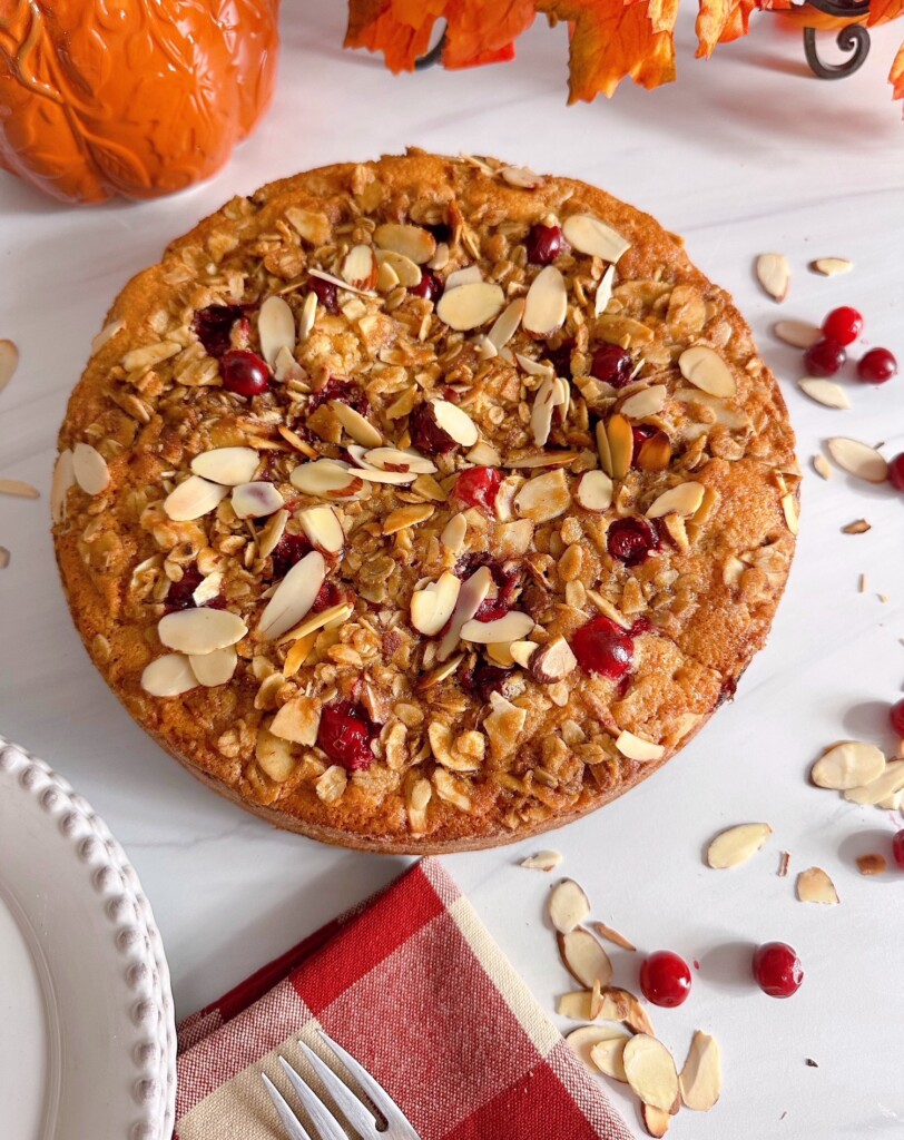 Cranberry Almond Orange Coffee Cake on a white table.