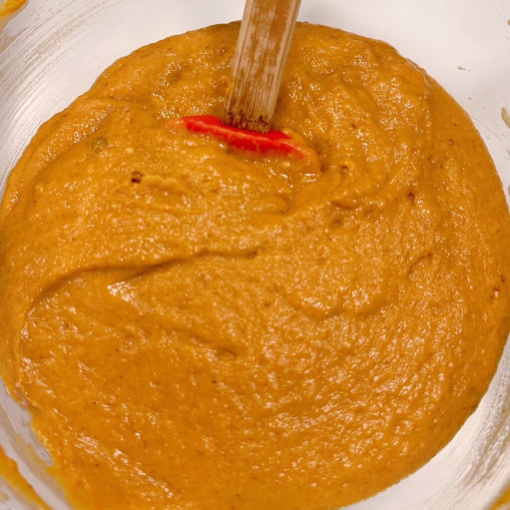 Pumpkin Muffin Batter in a large bowl.