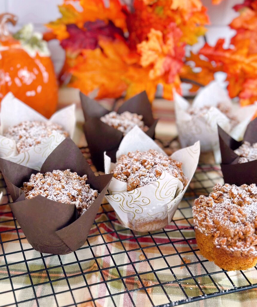 Pumpkin Ginger Streusel Muffins cooking on a wire rack.