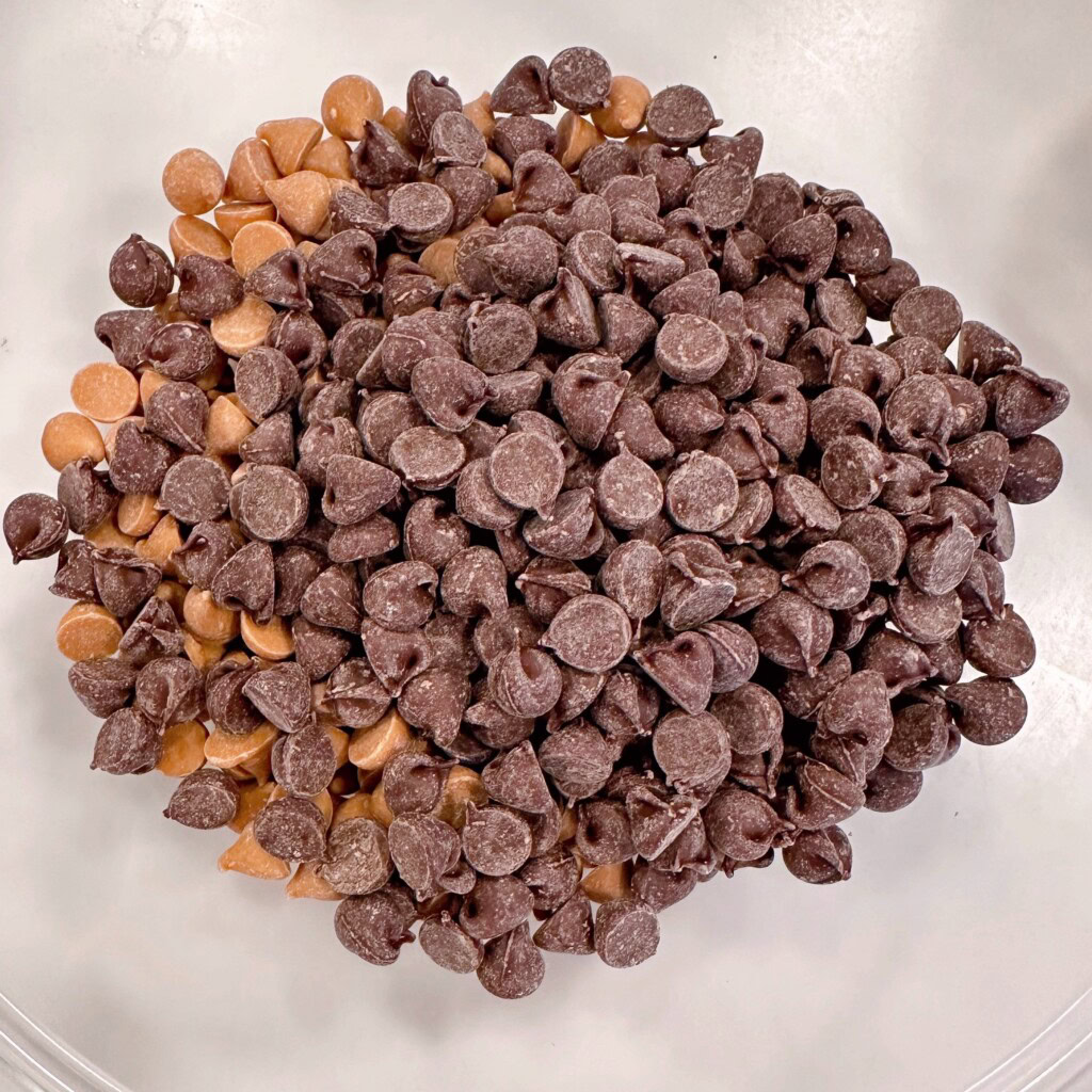 Chocolate chips with butterscotch chips in a bowl.